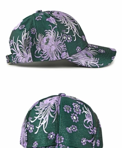 Detail of dark green ethnic baseball cap with purple chrysanthemum floral embroidery