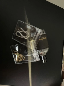 Transparent PE jewelry storage bags protecting silver bracelet and golden necklace
