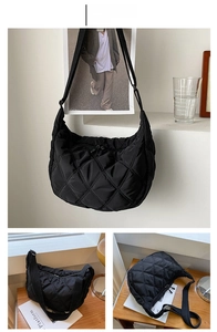 Detail of black quilted shoulder bag featuring premium stitching and durable fabric texture