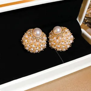 Elegant floral cluster pearl earrings with gold metal base and sparkling zircon accents