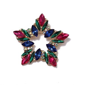 Vintage golden star brooch with colorful rhinestones and multi-color gemstones for women