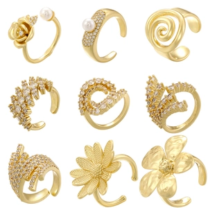 Detailed grid showing golden flower and shell rings with pearls and zircons