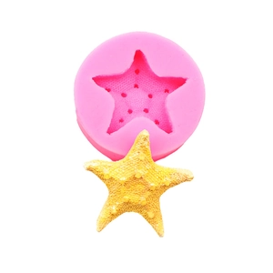 Stampo in silicone a stella marina rosa con fondente giallo testurizzato per decorazioni