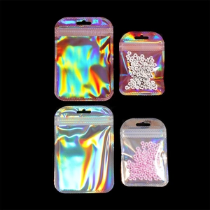 Detailed view of holographic laser resealable bags showing iridescent film and clear front