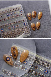 Macro detail of M-068 bronzing nail art sticker with gold mandala and ethnic patterns
