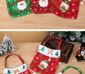 Close-up of Santa and snowman 3D gift bags with drawstring and holiday patterns