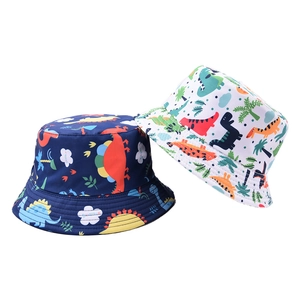Cappello reversibile in cotone per bambini con dinosauri colorati blu e bianco