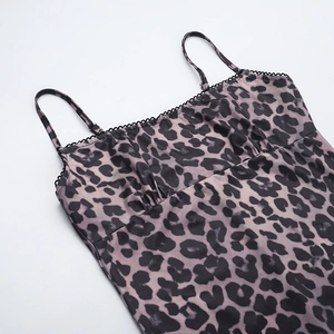 Detail of grey leopard print dress with slim spaghetti straps and pleated bust design