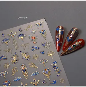 Détails d'autocollants pour ongles style chinois avec relief doré et motifs de grues