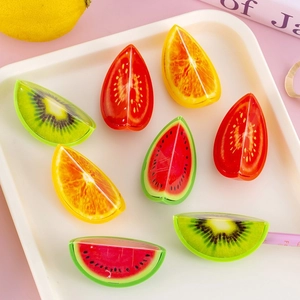 Set of 8 fruit-shaped pencil sharpeners featuring realistic watermelon and orange designs