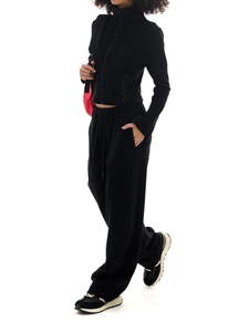 Women's black minimalist tracksuit set with zip-up high neck jacket and wide-leg trousers