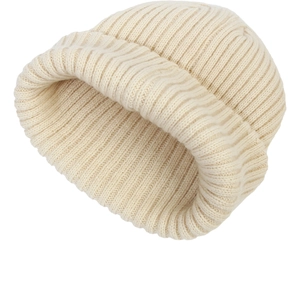 Detailed macro view of cream ribbed knit baby beanie hat with soft warm texture