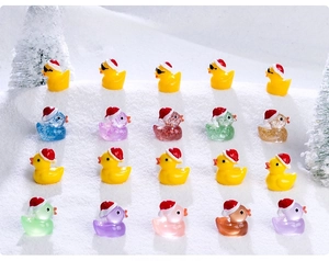 Miniature Christmas resin ducks with Santa hats in a 20-piece colorful snowy set