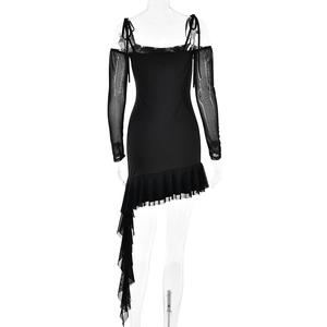 Detail of black off-shoulder mesh sleeve dress with asymmetrical ruffle hem and long train