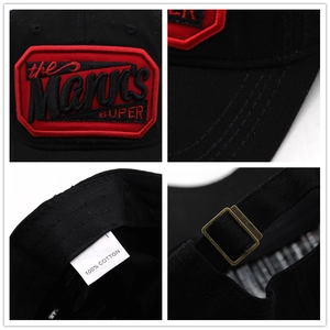 Black MANNS cotton baseball cap featuring red embroidery and adjustable metal buckle