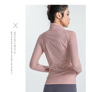 Detail of pink-purple slim fit sports jacket showing back seams and stand collar