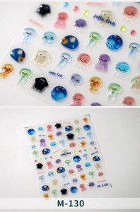 Macro shot of 3D resin jellyfish nail stickers M-130 with transparent glossy jelly texture