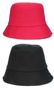 Detail of red and black cotton bucket hats with premium twill texture and stitching