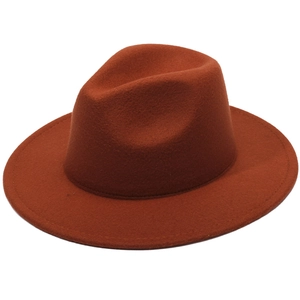 British style caramel wool felt fedora with a wide flat brim and indented crown design