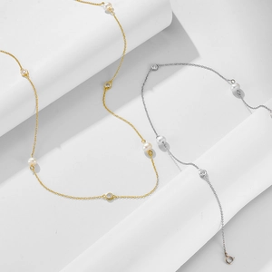 Minimalist sterling silver necklace with freshwater pearls and sparkling zircon stones