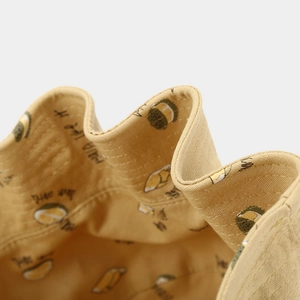Detail view of the durable canvas fabric with durian print and precise stitching lines