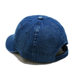 Detail view of denim baseball cap showing adjustable back strap and washed fabric texture