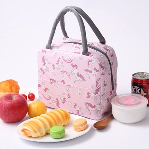 Pink insulated lunch bag with unicorn pattern and grey handle for daily meals