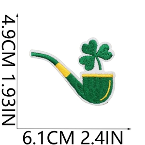 Saint Patrick's Day shamrock pipe embroidery patch with size measurements 6.1cm x 4.9cm