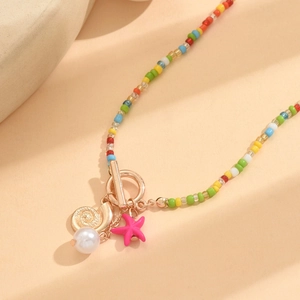 Colorful beaded necklace with golden seashell, pink starfish and pearl charms with OT clasp
