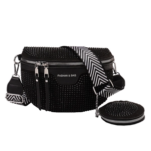 Fashionable black rhinestone crossbody saddle bag with a wide strap and mini coin pouch
