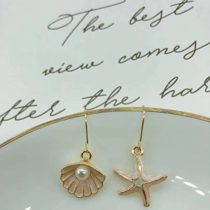 Asymmetric starfish and shell pearl drop earrings with S925 silver hooks in gold finish