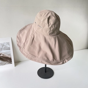 Classic khaki wide brim sun hat for women on display stand for outdoor UV protection