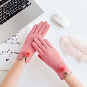 Detail of pink winter gloves for women with soft faux fur pompom and elegant grey piping