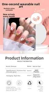 Detail view of 24pcs pink gradient press-on nails with white camellia floral art and glue