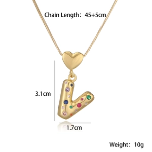 Detail shot of gold heart necklace with colorful zircon letter V and size specifications