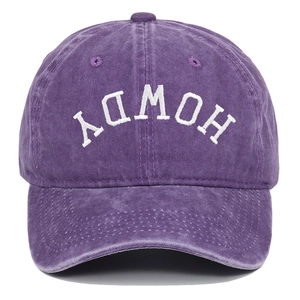 Close-up of Howdy embroidery on vintage washed purple cotton baseball cap with curved brim
