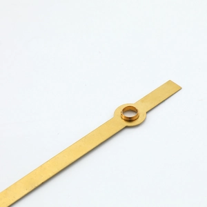 Polished golden quartz clock hands made of aluminum and copper with central mounting hole