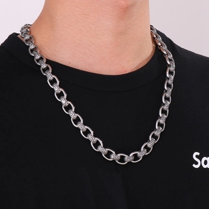 Close-up of 12mm stainless steel chain necklace with Greek key pattern for men