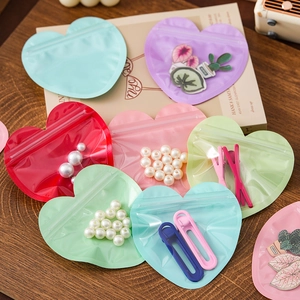Colorful heart shaped resealable pouches for jewelry packaging and small gift storage