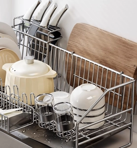Macro detail of 304 stainless steel kitchen drying rack with slots for dishes and cutlery