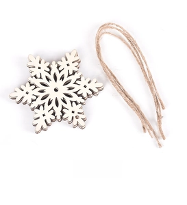Detail showing natural wood snowflake ornaments with rustic twine for DIY crafts