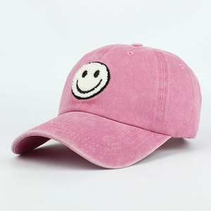 Pink washed cotton baseball cap for parents and kids with towel embroidered smiley face