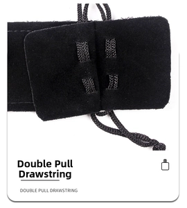 Detailed close-up of premium black velvet pouch with double pull drawstring closure