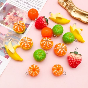 Macro view of creative acrylic fruit pendants with realistic textures for DIY jewelry