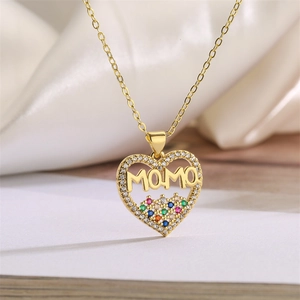 Close-up of gold heart necklace with MOMO lettering and colorful zircon stones