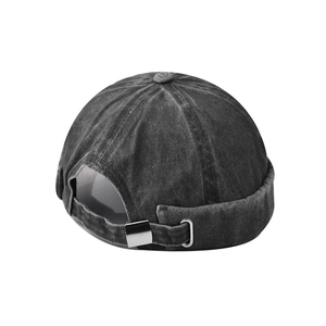 Washed black denim brimless docker hat with six-panel design and adjustable metal buckle