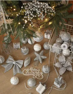 Silver and white Christmas tree ornaments set including glitter baubles and star topper