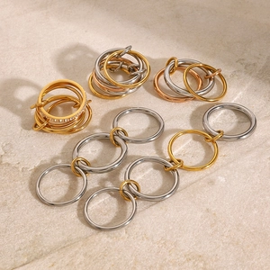 Stackable stainless steel rings in gold, silver, and rose gold with zircon details