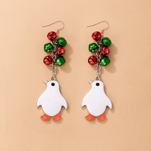 Detail of Christmas bell earrings with colorful bells and cute white penguin charms