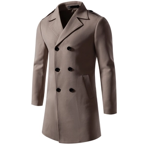 Detailed macro view of khaki trench coat showing twill fabric texture and button details